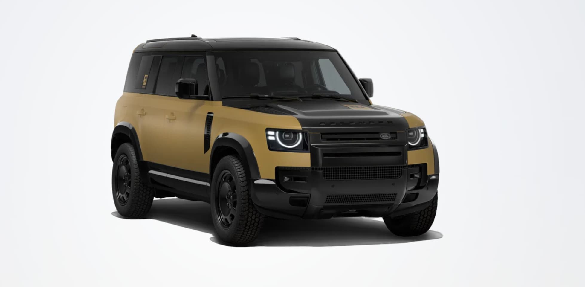 Land Rover Defender 110 - 2.0 P300e 110 Trophy Edition Deep Sandglow Yellow | Satin Protective Film | Off-Road Pack - AutoWereld.nl