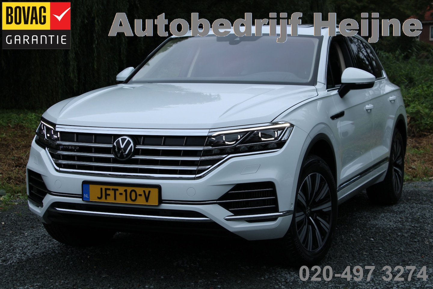 Volkswagen Touareg - 3.0 TSi eHybrid ATMOSPHERE 4MOTION TREKHAAK/HEAD-UP/PANORAMADAK - AutoWereld.nl