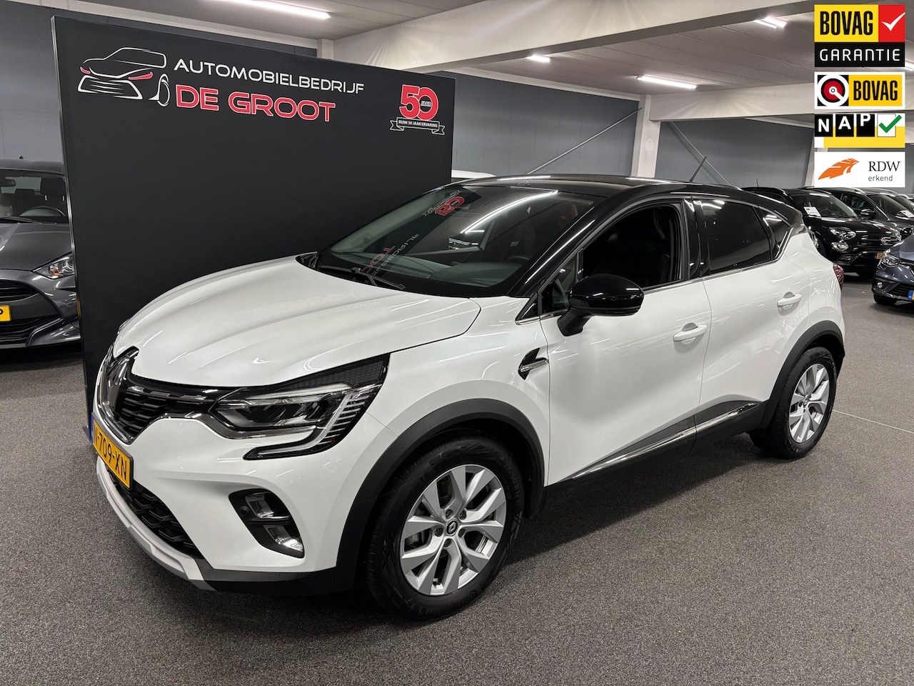 Renault Captur - 1.6 E-Tech Hybrid 145 Intens/ Nederlandse auto/ 25.828 KM/ Navi/ Achteruitrijcamera - AutoWereld.nl