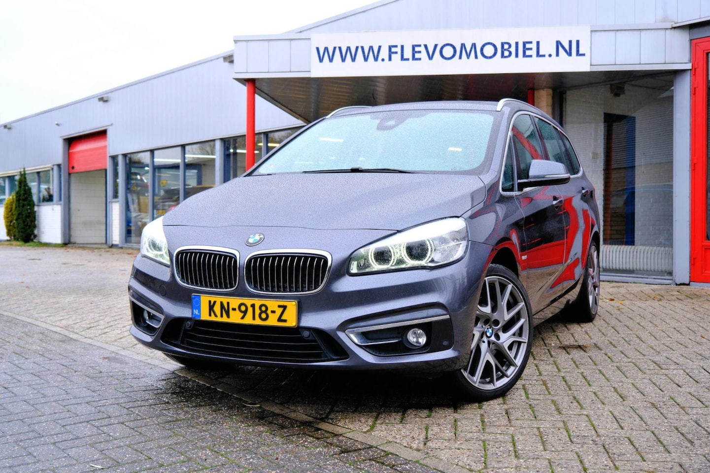 BMW 2-serie Gran Tourer - 220i 192pk Centennial High Executive 7-pers Aut. Pano|Leder|Sporstoelen|LMV|HarmanKardon - AutoWereld.nl