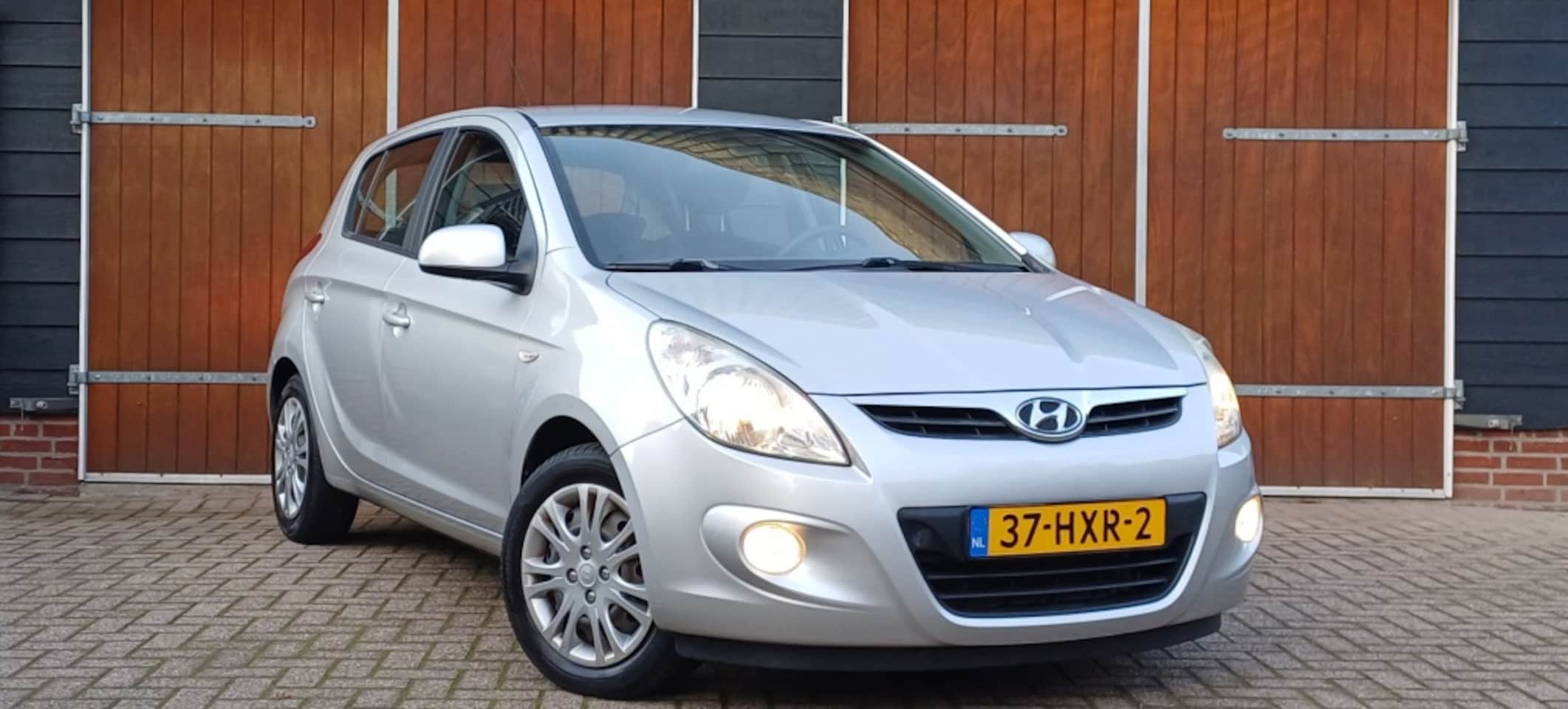 Hyundai i20 - 1.4i Dynamic, Trekhaak, NAP, Airco, All seasonbanden - AutoWereld.nl