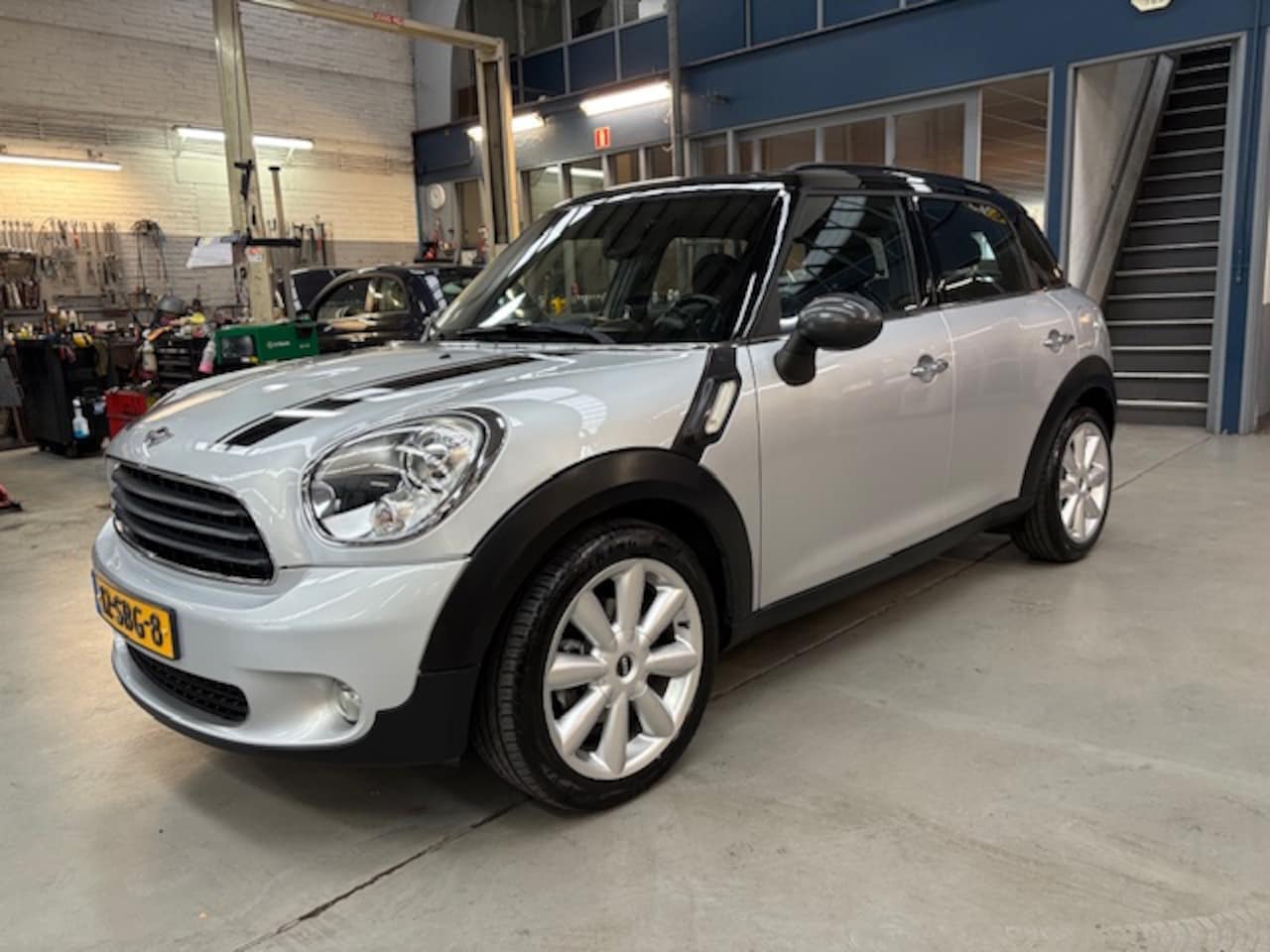 MINI Countryman - 1.6 COOPER Business line | afn. Trekhaak | airco | schuif- kanteldak | navigatie | Nap | R - AutoWereld.nl
