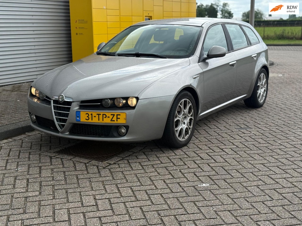 Alfa Romeo 159 Sportwagon - 1.9 JTD 6Bak ECC Airco CarPlay PDC Nieuwe APK - AutoWereld.nl