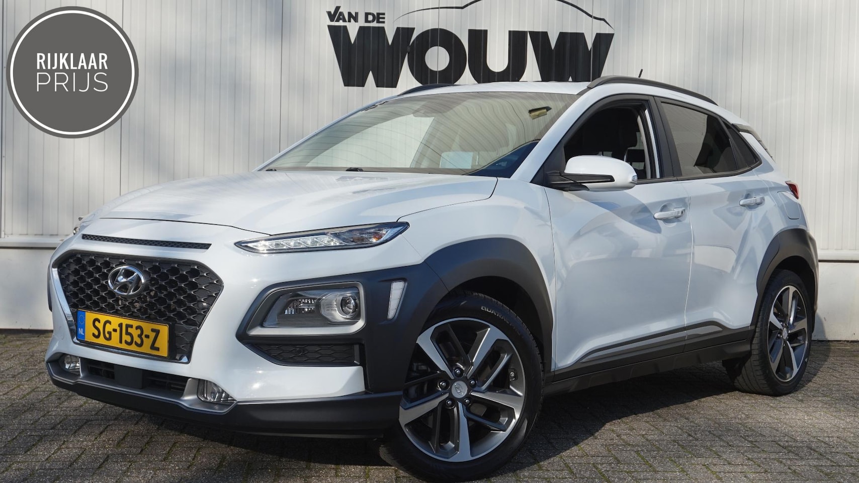 Hyundai Kona - 1.6 T-GDI 177PK Premium 4WD Automaat | Trekhaak | Schuif-Kanteldak | All-Season | HUD | Ca - AutoWereld.nl