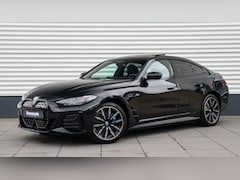 BMW i4 - eDrive35 High Executive M-Sport | Harman/Kardon | Schuifdak | Head-up | Trekhaak | Driving