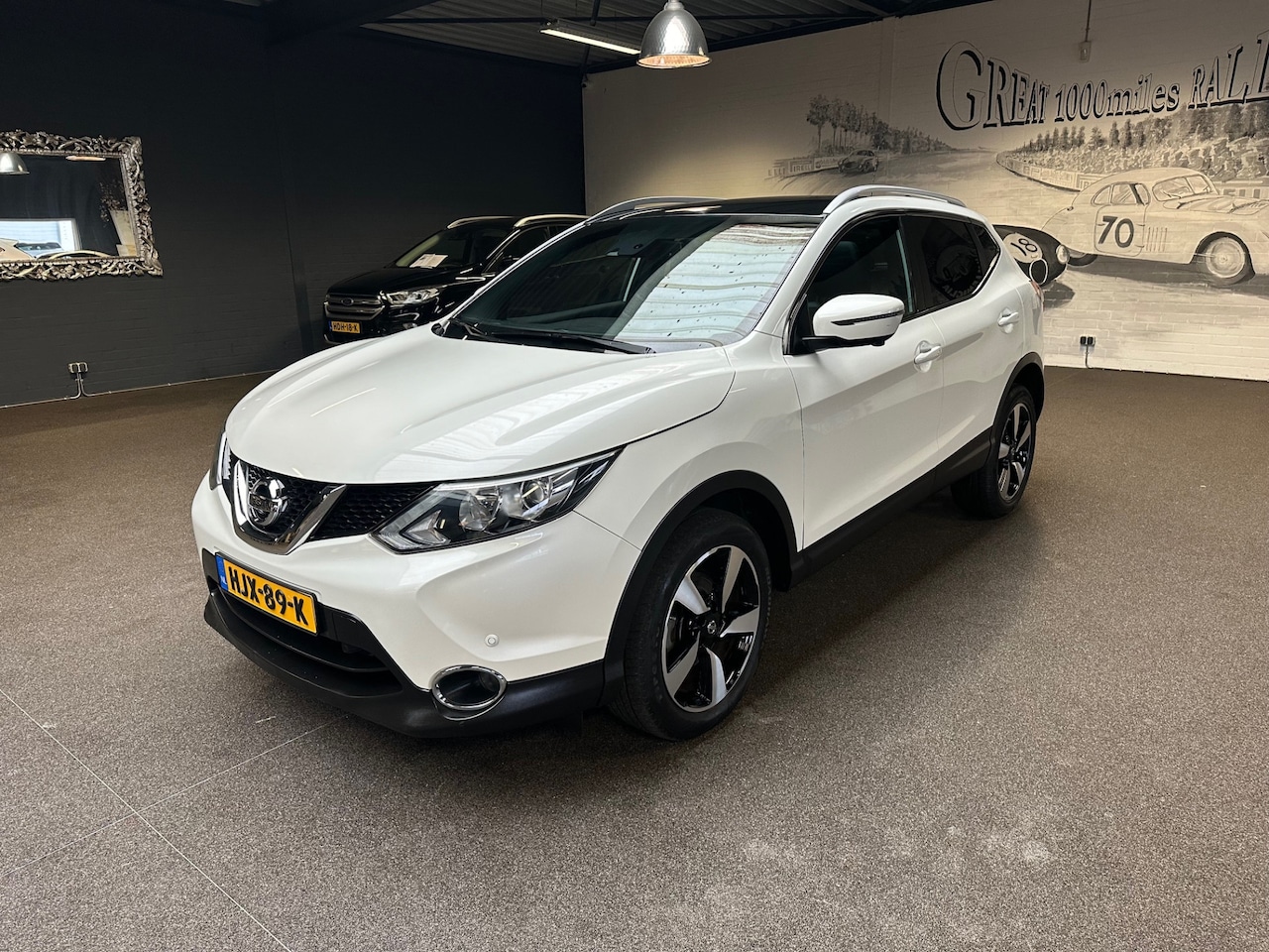 Nissan Qashqai - 1.2 Tekna + PANO-DAK*NAVI*360 CAMERA*ELEK STOELEN+VERW* - AutoWereld.nl