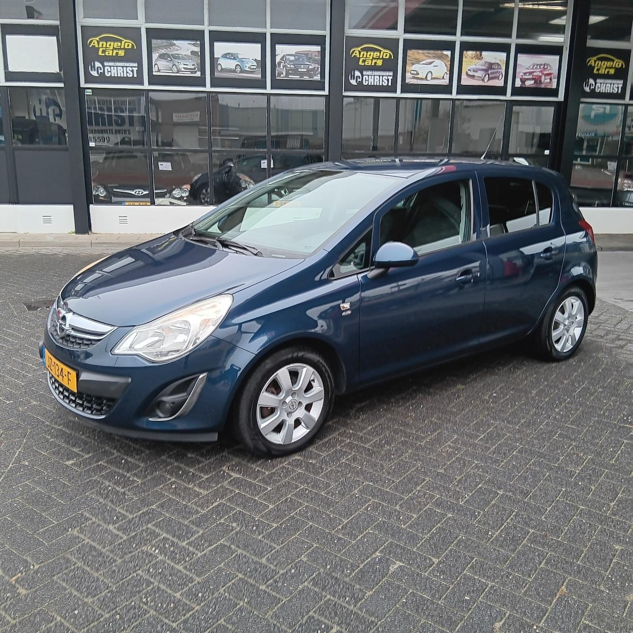 Opel Corsa - 1.4-16V Cosmo Vol Automaat - AutoWereld.nl