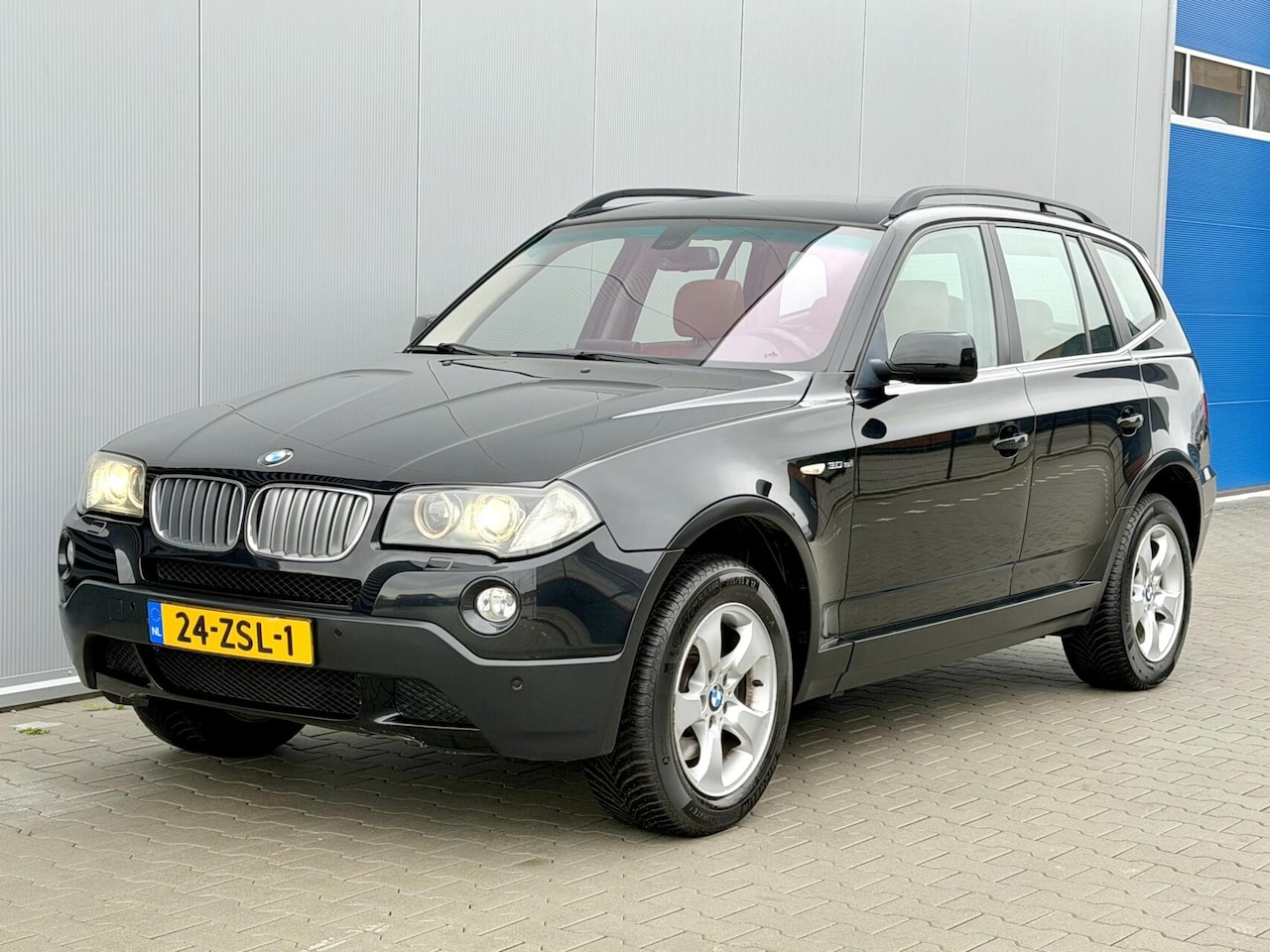 BMW X3 - 3.0si High Exe | Pano | Xenon | Leer | Navi | PDC - AutoWereld.nl