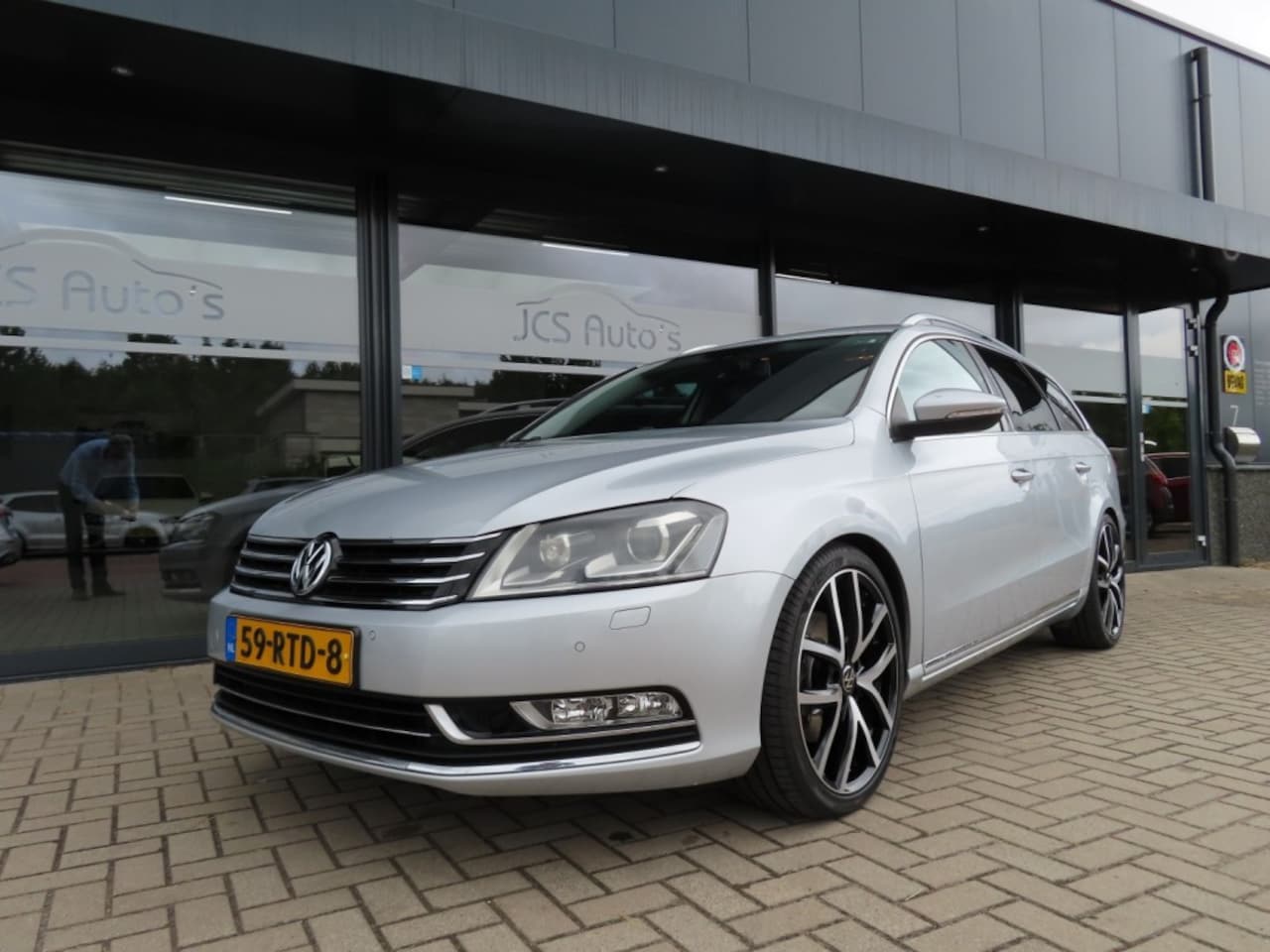Volkswagen Passat - 2.0 TSI Highline DSG Leder Navi 19 Inch 2x Pdc 2011 - AutoWereld.nl