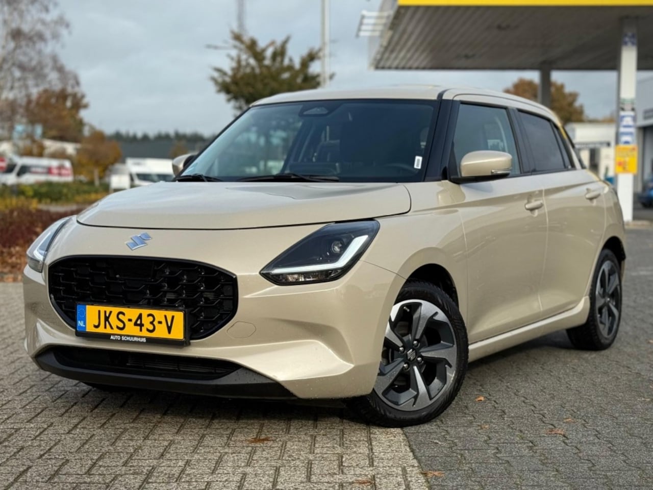 Suzuki Swift - 1.2 STYLE SMART HYBR. KEYLESS ECC CAMERA NAVI ADD. CRUISE - AutoWereld.nl