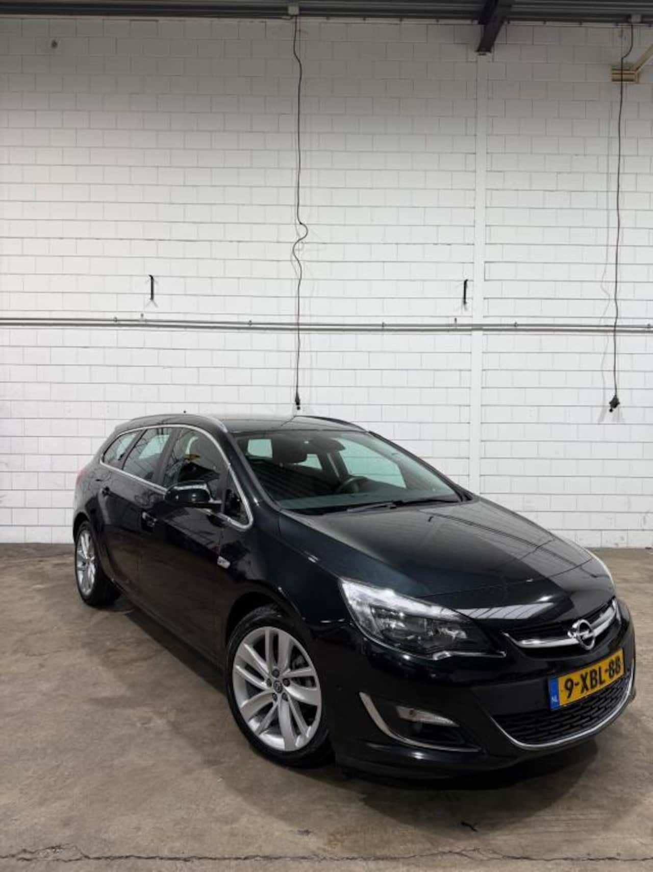 Opel Astra Sports Tourer - 1.4 Turbo Sport 1.4 Turbo Sport - AutoWereld.nl