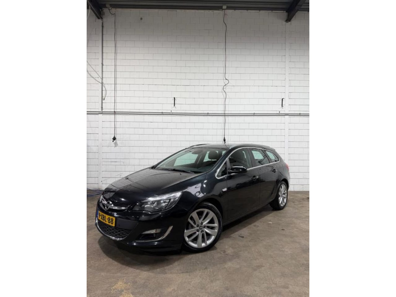 Opel Astra Sports Tourer - 1.4 Turbo Sport 1.4 Turbo Sport - AutoWereld.nl