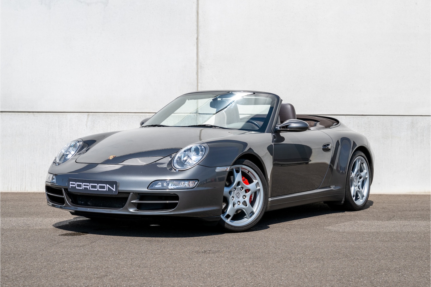 Porsche 911 Cabrio - Carrera 4S BOSE / Stoelverwarming / ParkAssist - AutoWereld.nl