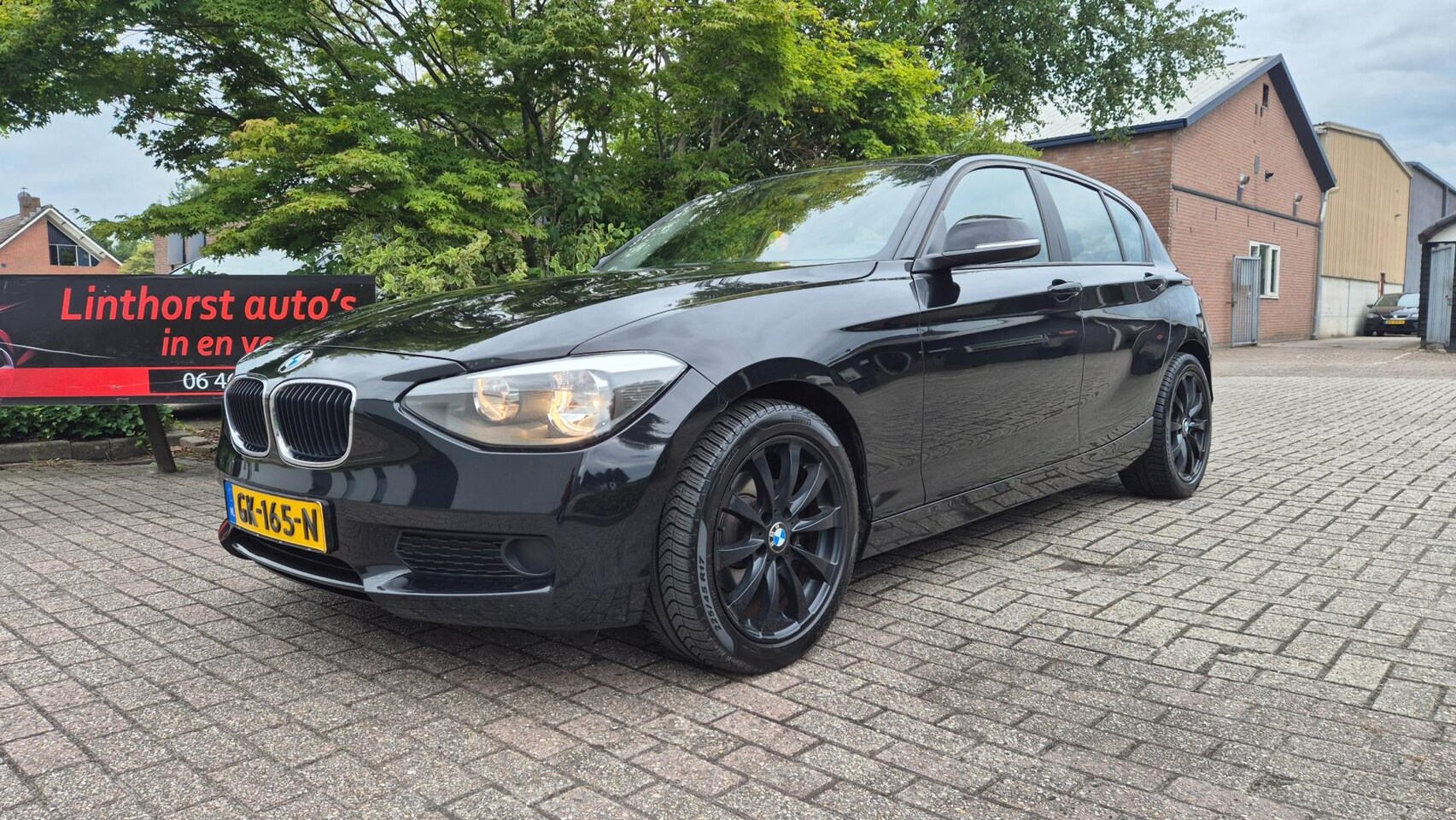 BMW 1-serie - 118d Business CLIMA-NAVI-BJ 2013 - AutoWereld.nl
