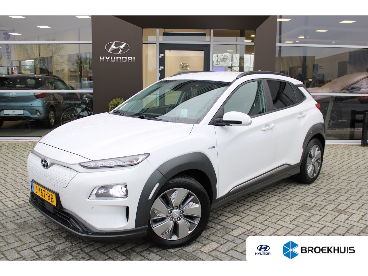 Hyundai Kona Electric - EV Premium 64 kWh | Leder | Elektrisch bedienbare voorstoelen | Stoelverwarming / ventilat - AutoWereld.nl