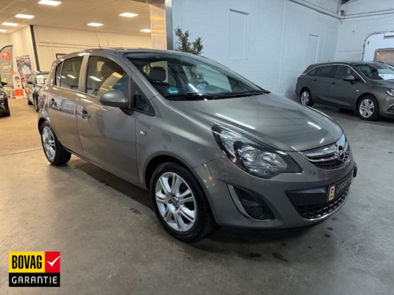 Opel Corsa - 1.2-16V BlitZ/NAVI/PDC/LMV/ECC - AutoWereld.nl