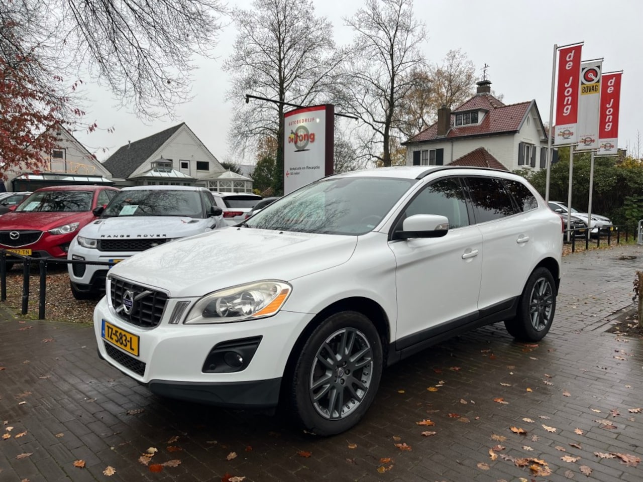 Volvo XC60 - 2.4D AWD AUTOMAAT / LEDER / NAVI / CAMERA / TREKHAAK / STOELVERW. - AutoWereld.nl