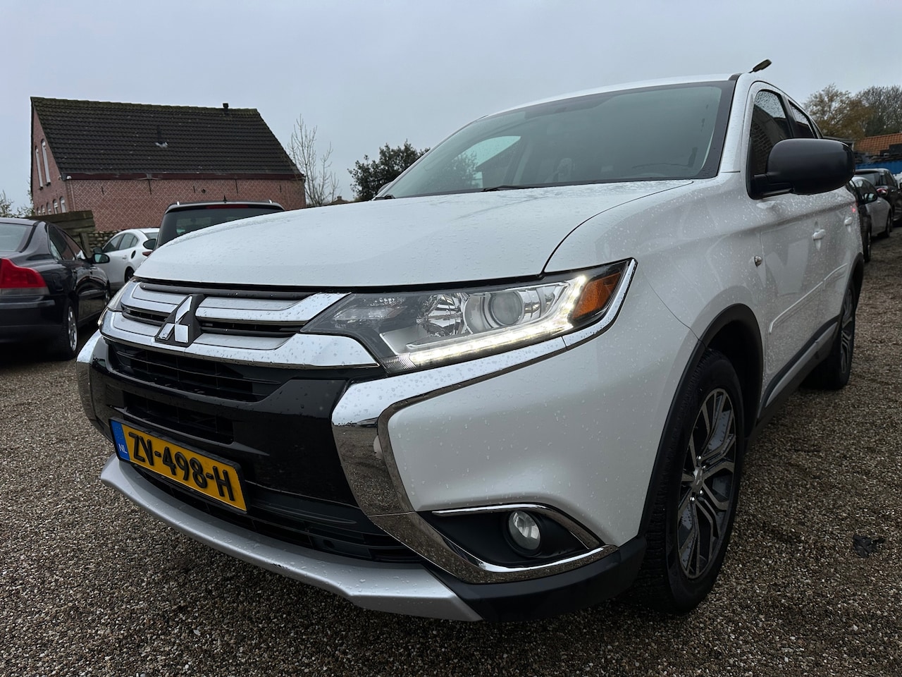 Mitsubishi Outlander - 2.4 Edition Two 7Persoons Eerste Eigenaar Goed Onderhouded Aantoonbaar - AutoWereld.nl