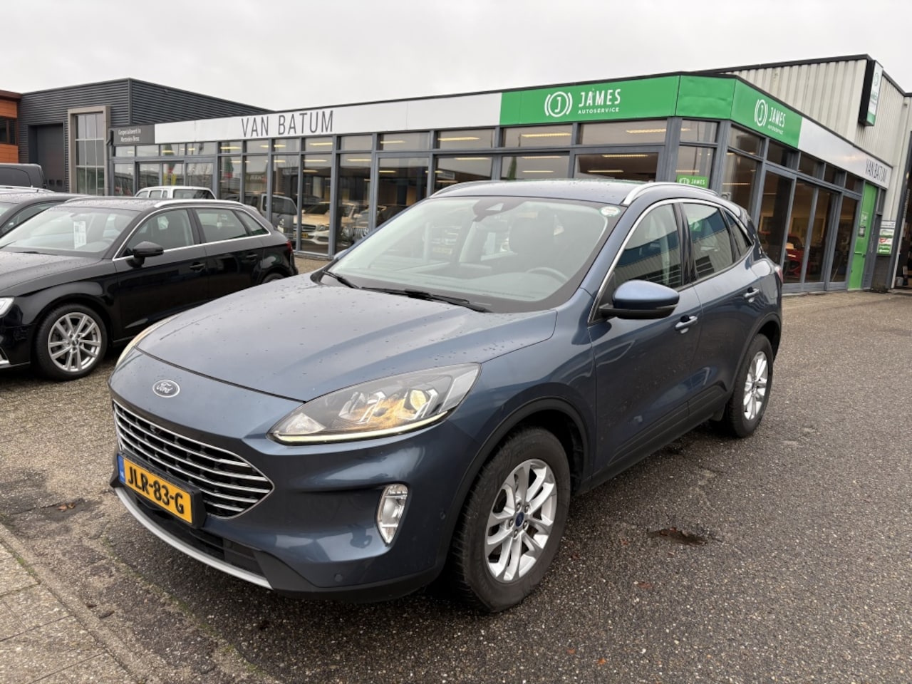 Ford Kuga - 2.5 FHEV Titanium Hybride - AutoWereld.nl