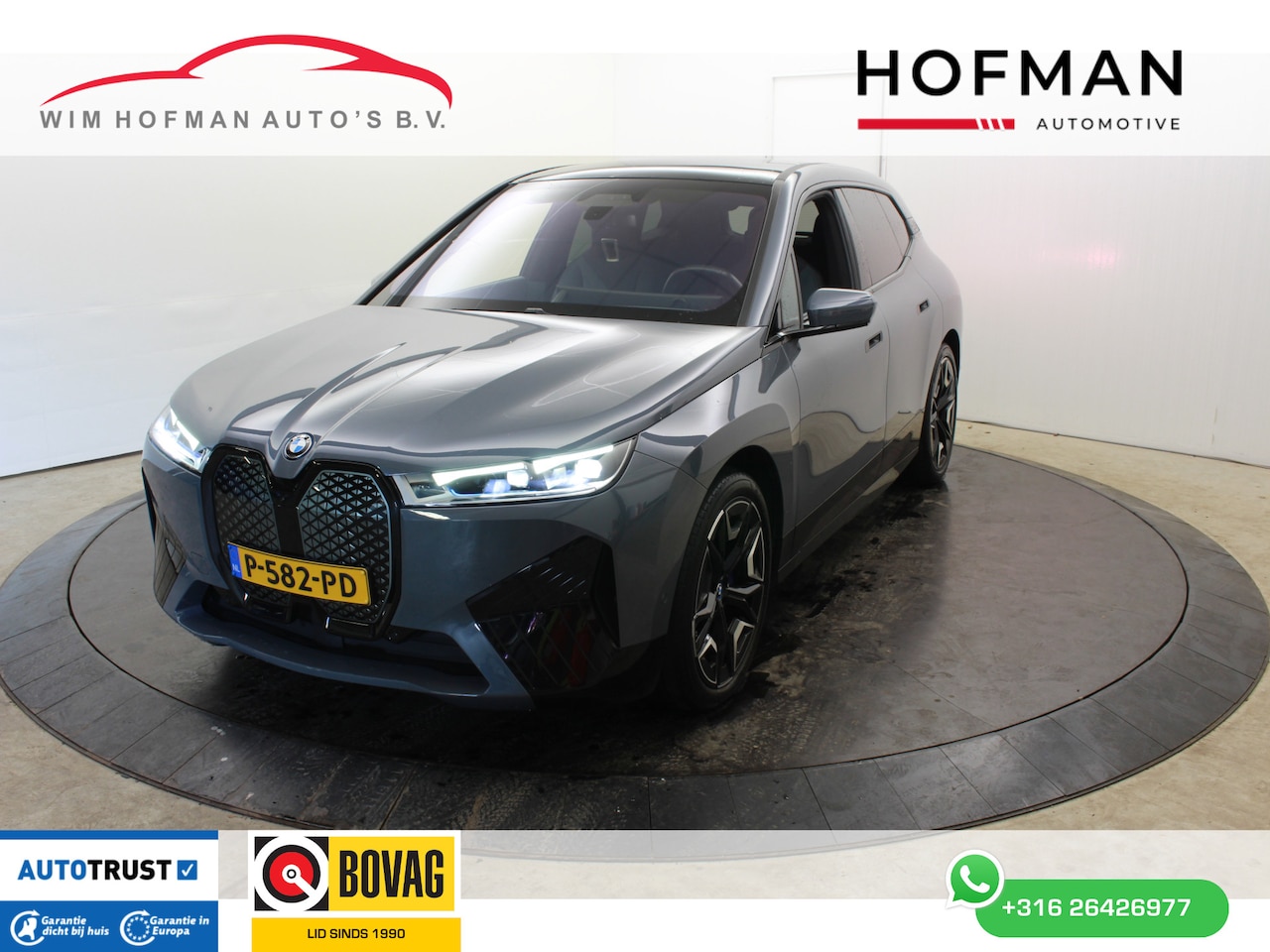 BMW iX - xDrive40 High Executive 77 kWh SOH 100% El Trekhaak Panodak Head Up Camera - AutoWereld.nl