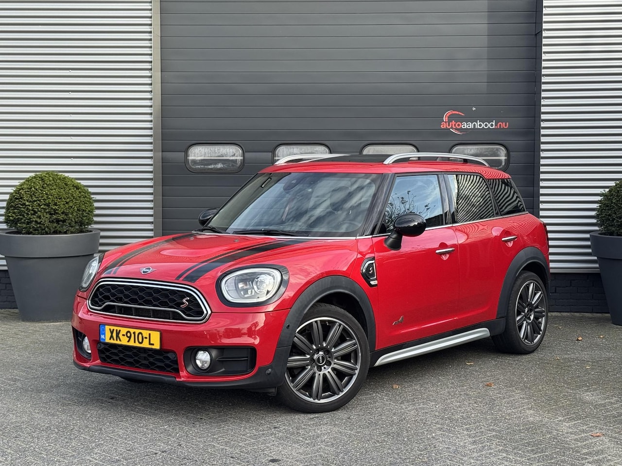 MINI Countryman - Mini 2.0 Cooper SD ALL4 JCW | Panoramadak | Head-Up Display | Harmon Kardon | Navigatie | - AutoWereld.nl