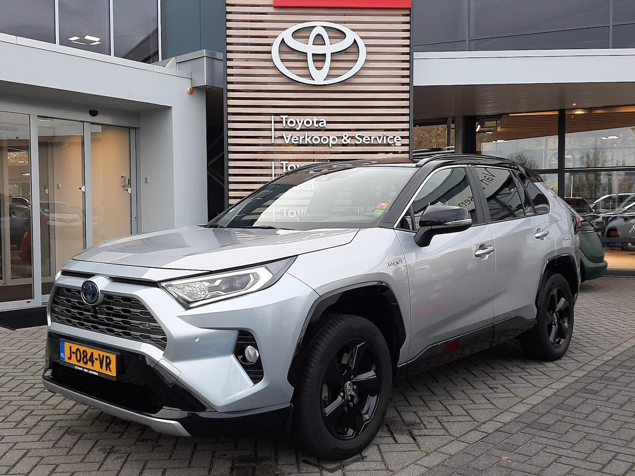 Toyota RAV4 - 2.5 HYBRID AWD BI-TONE TREKHAAK JBL-AUDIO NAVI BLIND-SPOT LEDER PARK-SENSOREN KEYLESS LM-V - AutoWereld.nl
