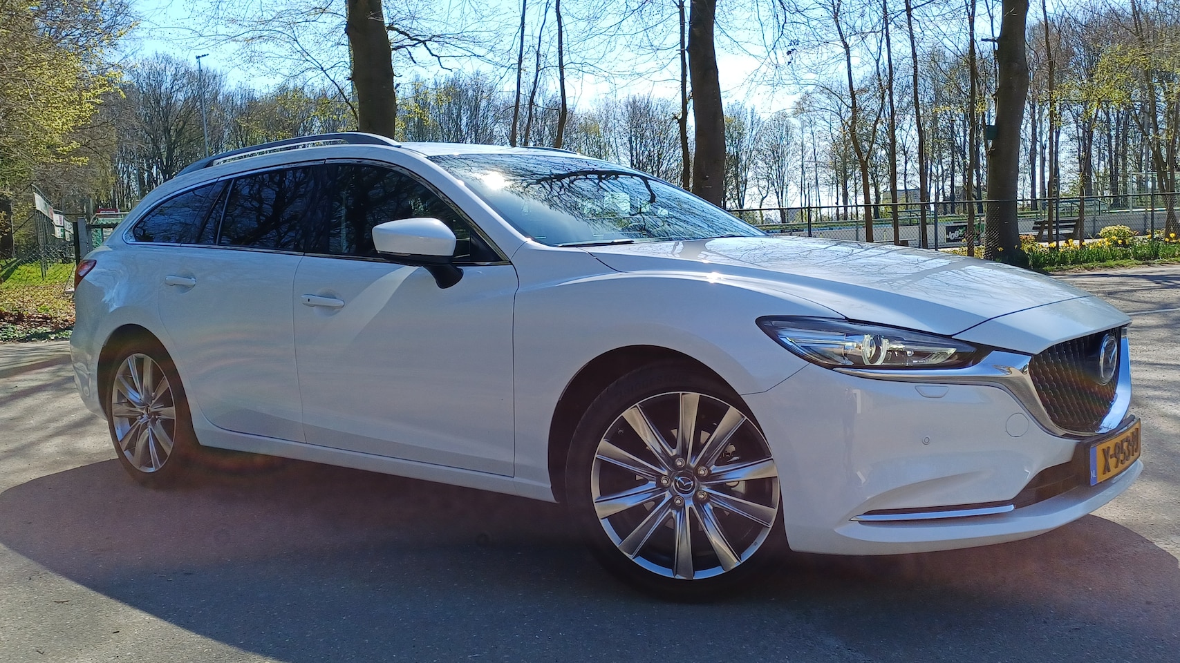 Mazda 6 Sportbreak - 2.0 SkyActiv-G 165 Exclusive-Line Uniek wit parelmoer - AutoWereld.nl