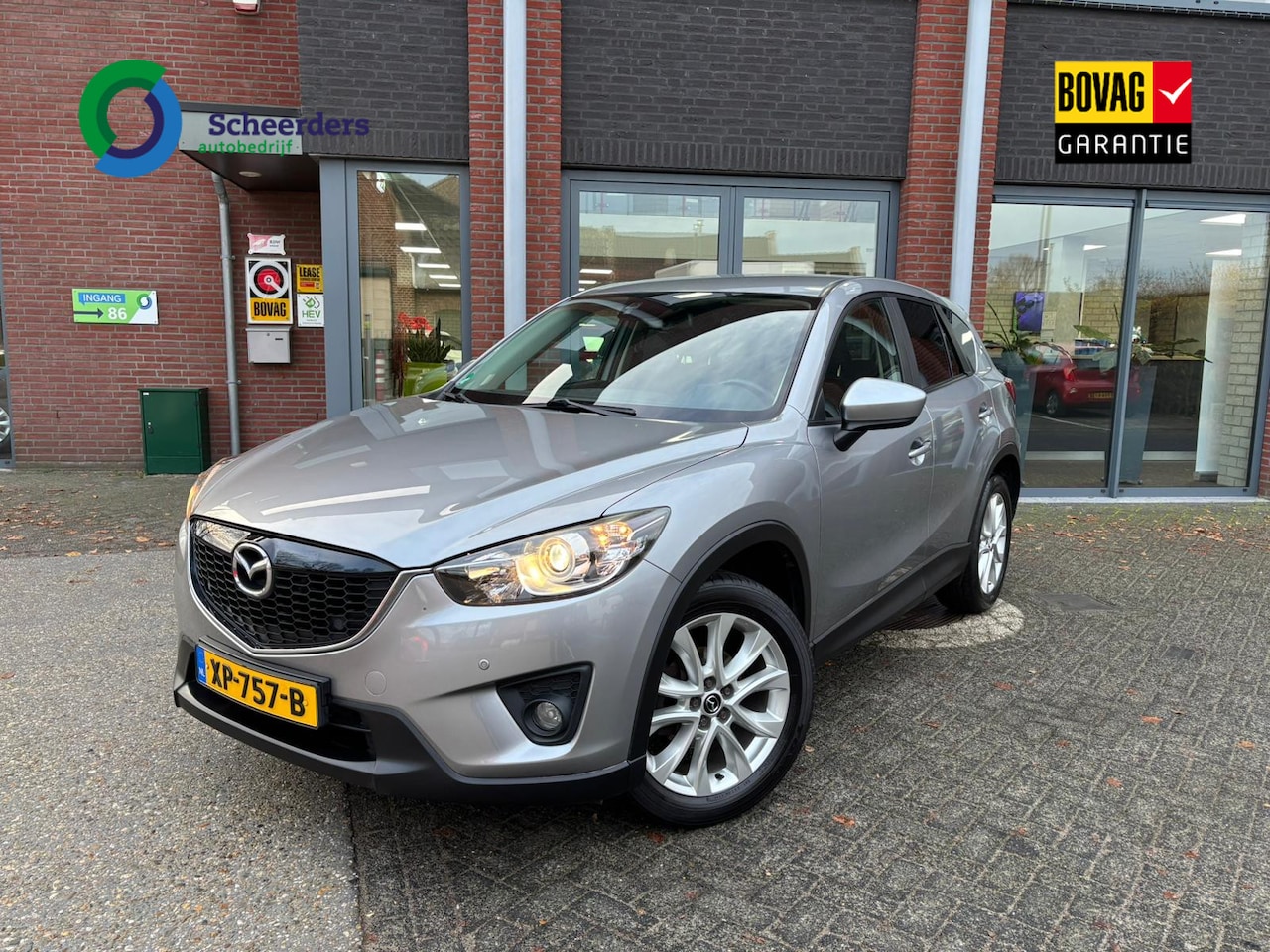 Mazda CX-5 - 2.0 TS 2WD 2.0 TS+ 2WD,Navi,Trekhaak,1 jaar garantie - AutoWereld.nl