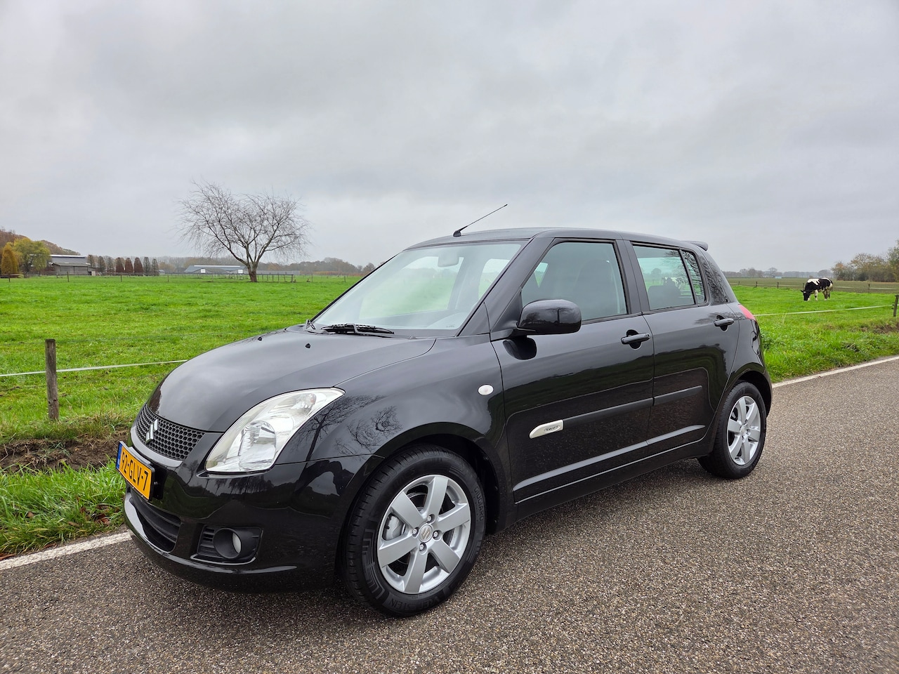 Suzuki Swift - 1.3 Bandit /15'LM/Keyless/Climate/Sportstoelen/NAP! - AutoWereld.nl