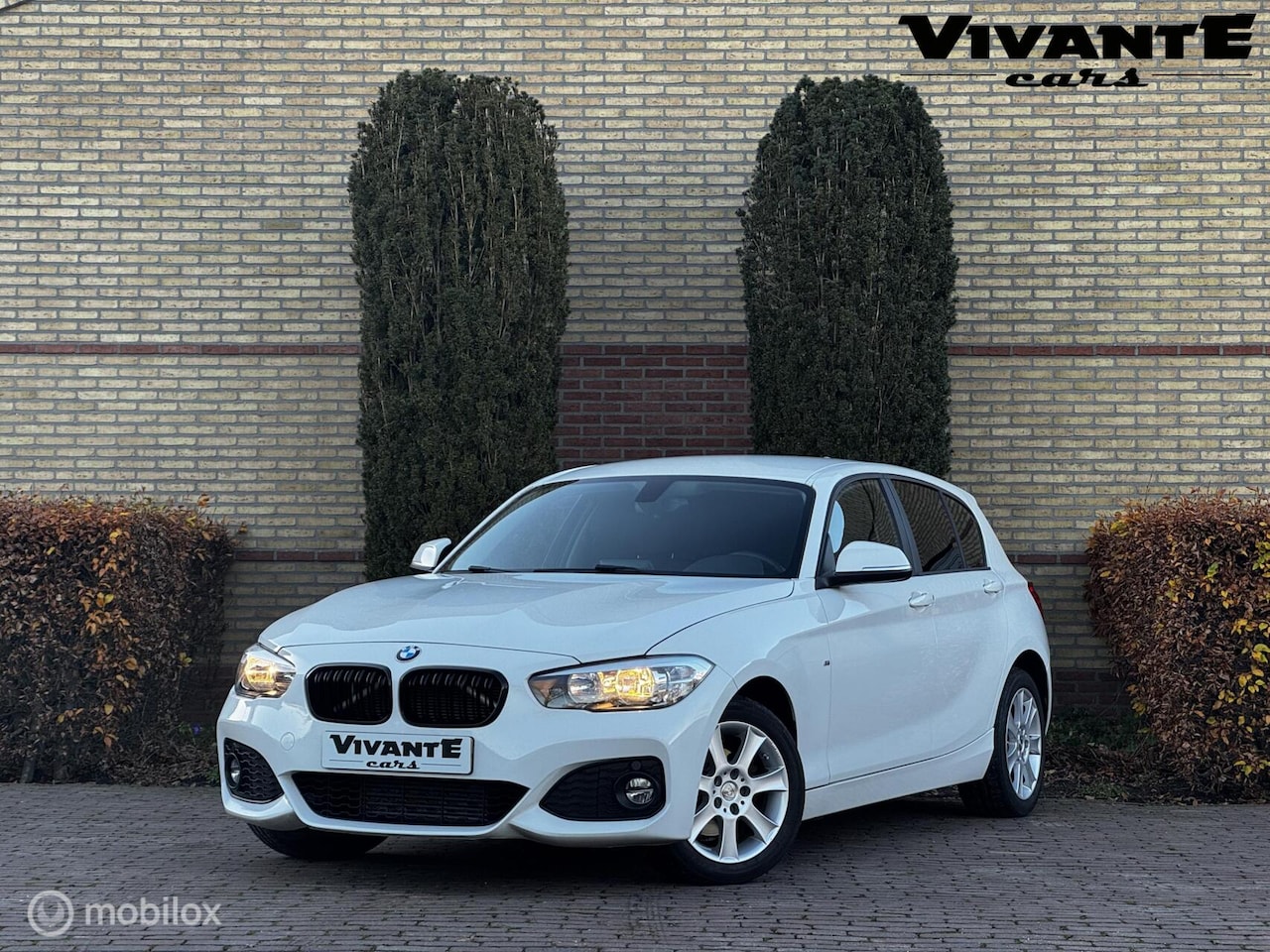 BMW 1-serie - 118i Cruise*Stoel.vrw*Clima*Bluetooth*PDC achter - AutoWereld.nl