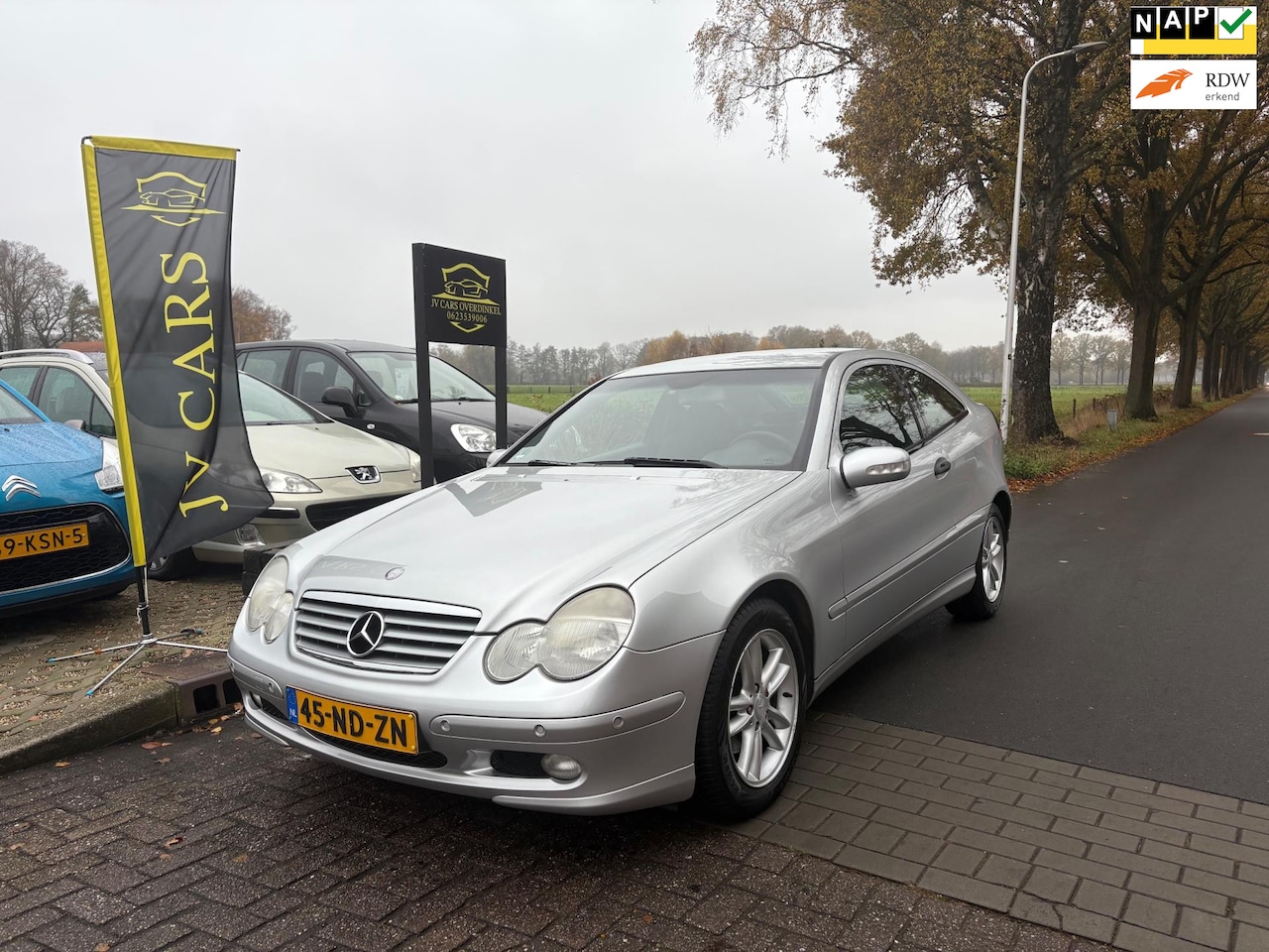 Mercedes-Benz C-klasse Sportcoupé - 180 K. Amice AIRCO,CRUISE,PDC VOOR/ACHTER,AUTOMAAT,SPORTVELGEN,MET APK! - AutoWereld.nl