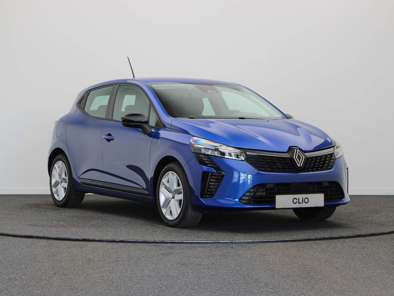 Renault Clio - Evolution Hybrid 145 | Cruise control met snelheidsbegrenzer | Handbediende airconditionin - AutoWereld.nl