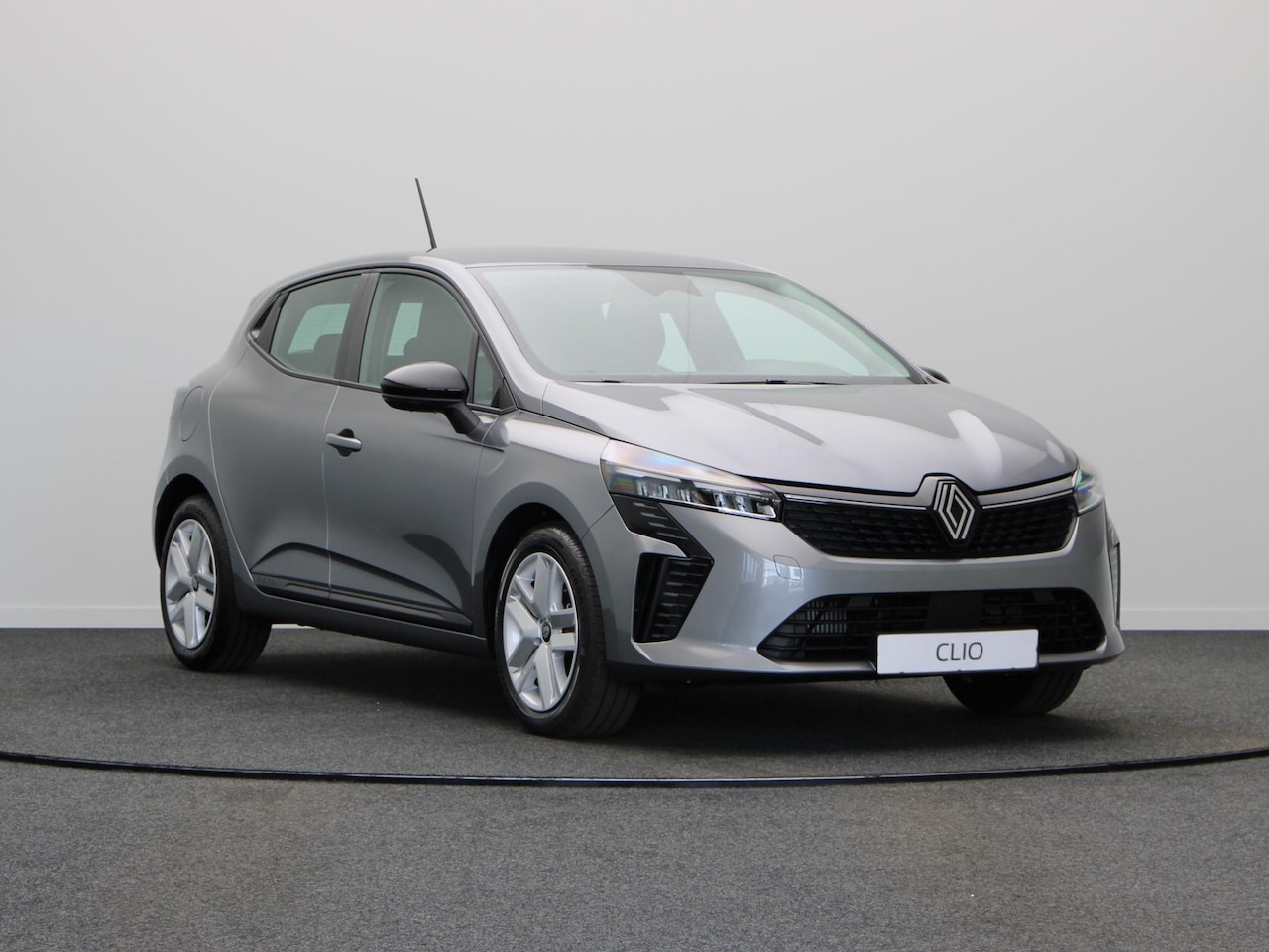 Renault Clio - Evolution Hybrid 145 | Cruise control met snelheidsbegrenzer | Handbediende airconditionin - AutoWereld.nl