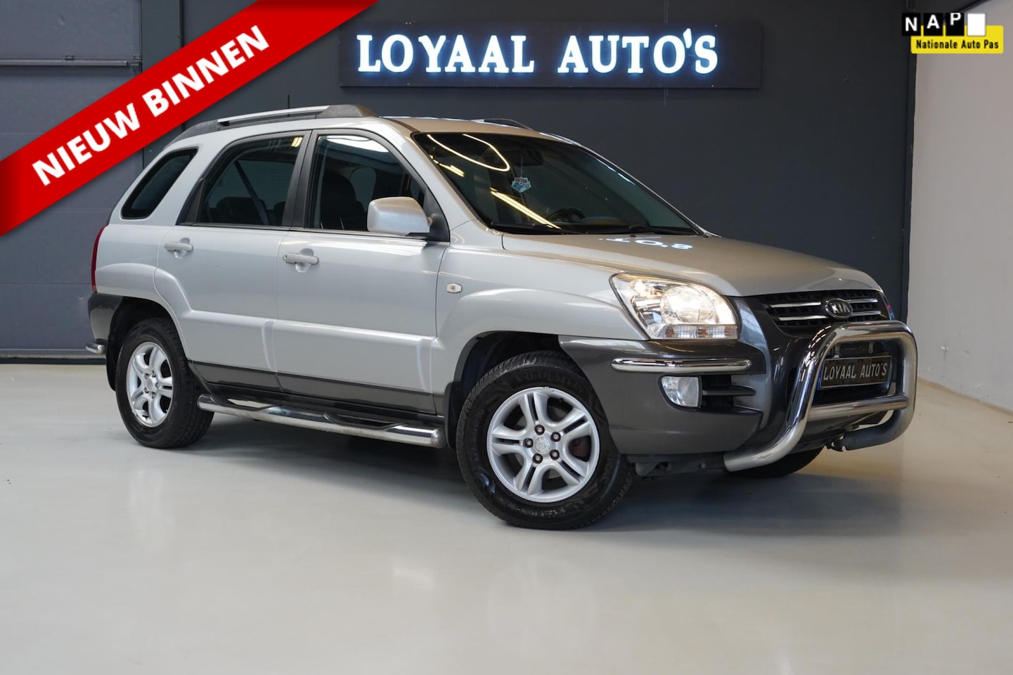 Kia Sportage - 2.0 CVVT X-ecutive | TREKHAAK | AIRCO | ELEK.RAMEN | NAP | APK. - AutoWereld.nl