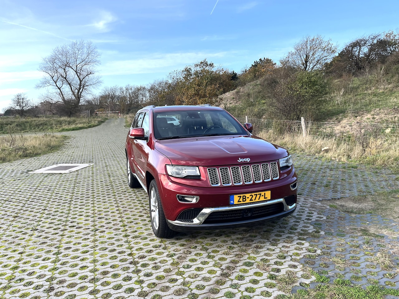 Jeep Grand Cherokee - 5.7 Overland Summit Hemi - AutoWereld.nl