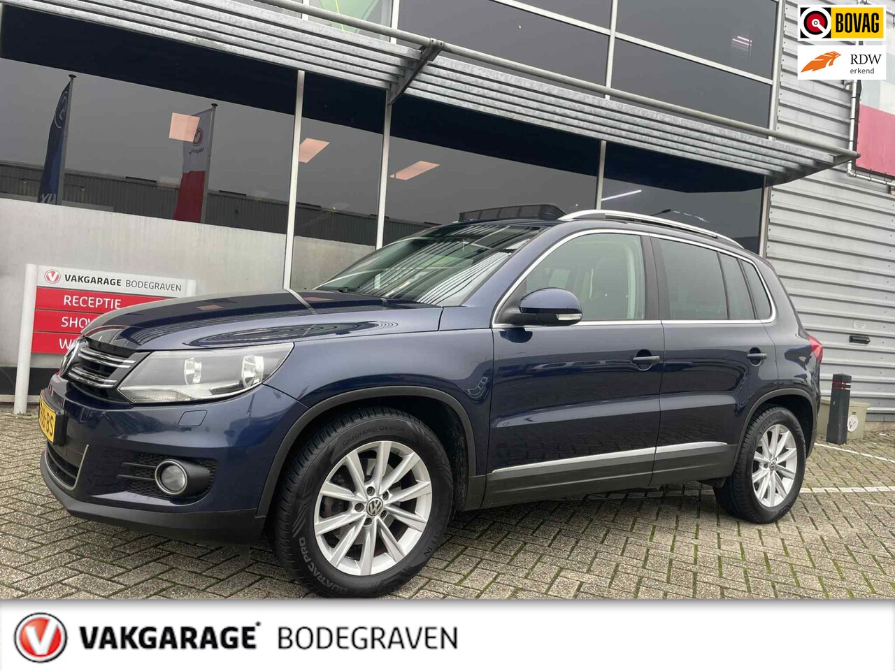 Volkswagen Tiguan - 1.4 TSI Sport&Style - AutoWereld.nl
