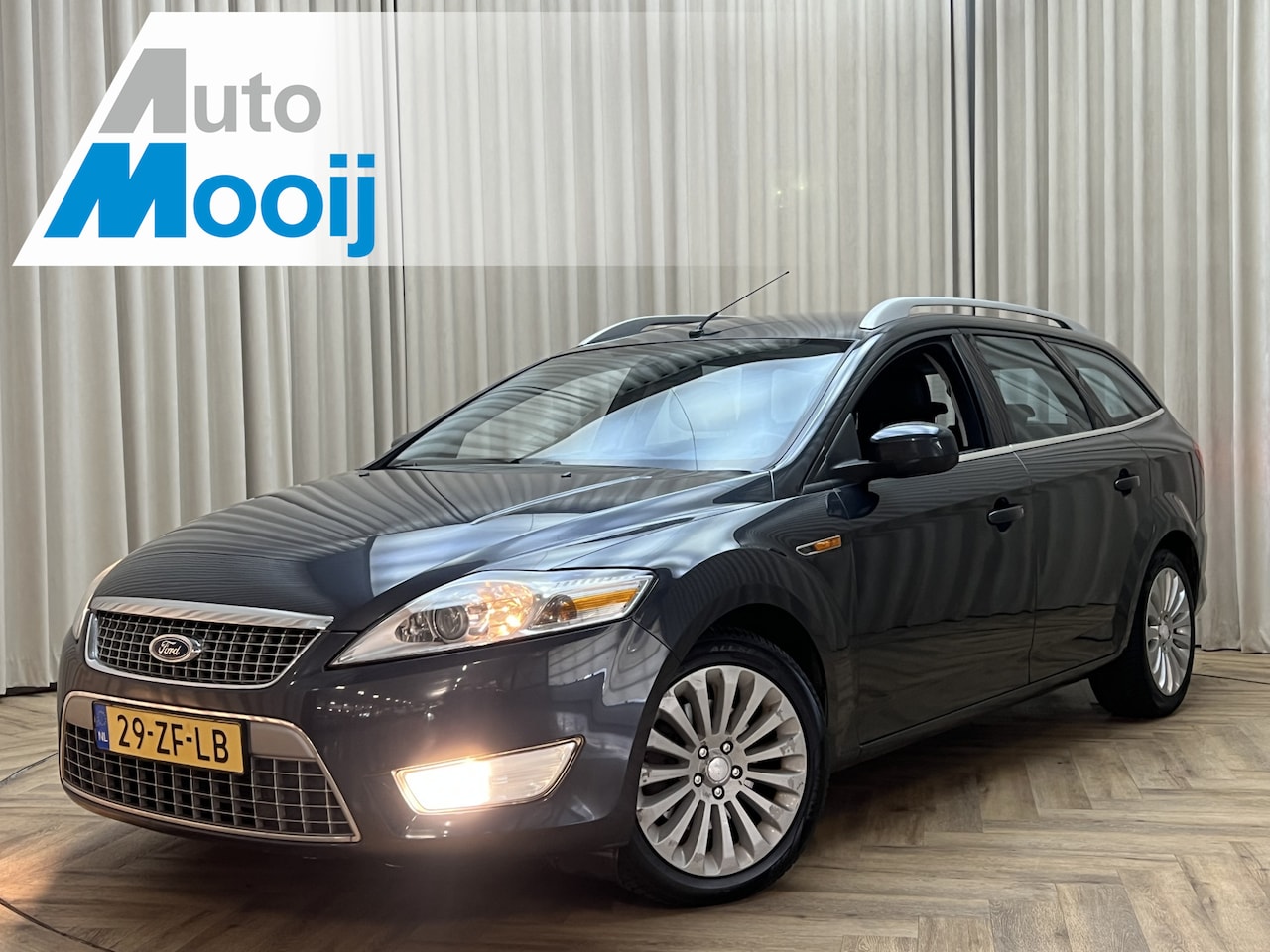 Ford Mondeo Wagon - 2.0-16V Titanium *Trekhaak* PDC V+A / Elektr. Stoelen + Verwarmd / Navi / Bluetooth / Half - AutoWereld.nl