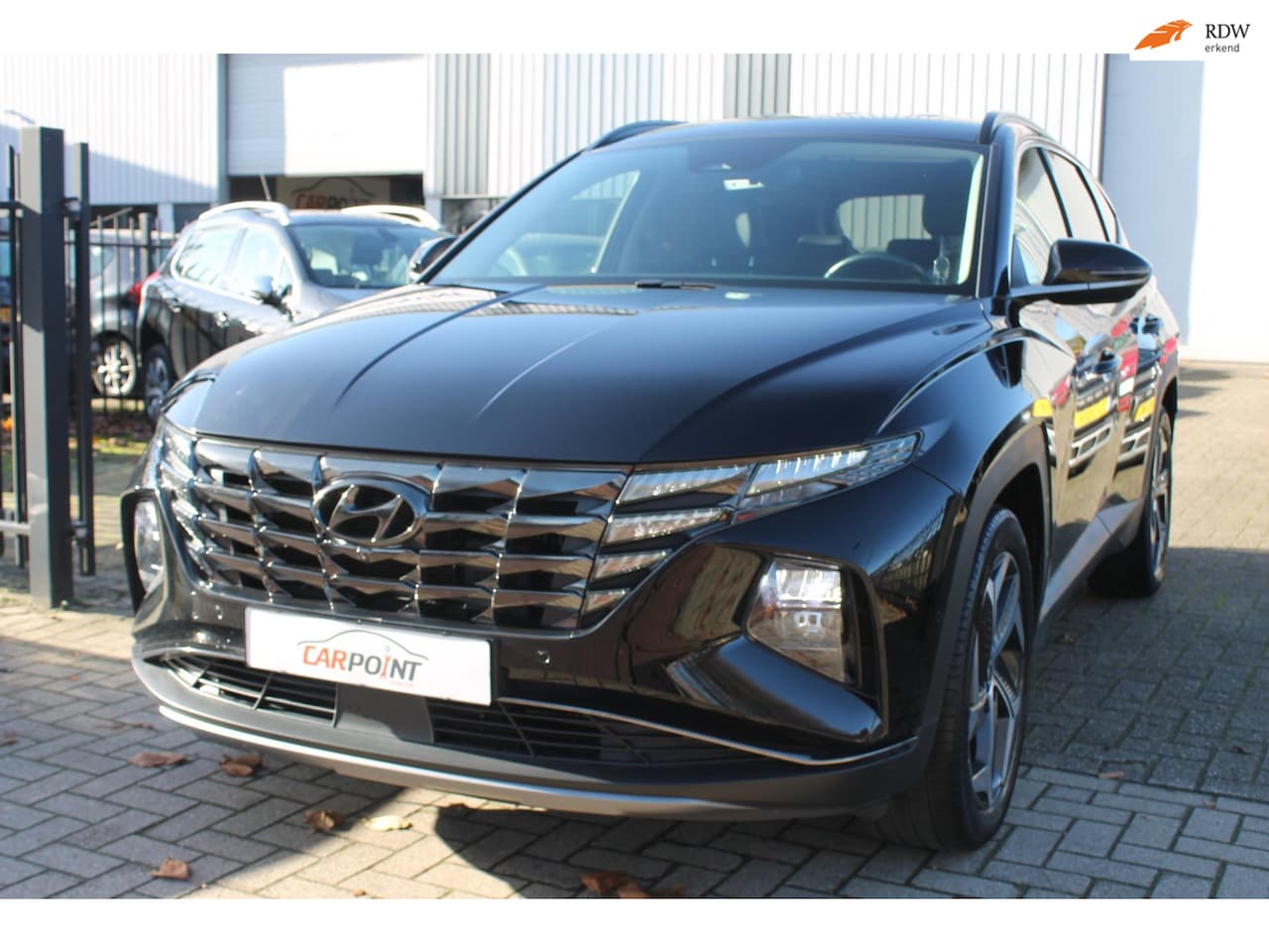 Hyundai Tucson - 1.6 T-GDI HEV Premium Sky ACC 360 Leer VOL!! - AutoWereld.nl