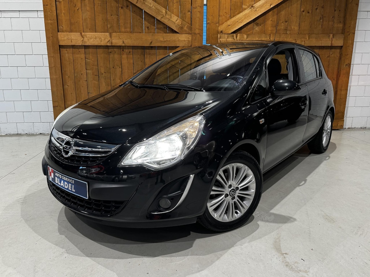 Opel Corsa - 1.2-16V Cosmo Automaat Navi/Cruise/Half leder/Pdc - AutoWereld.nl