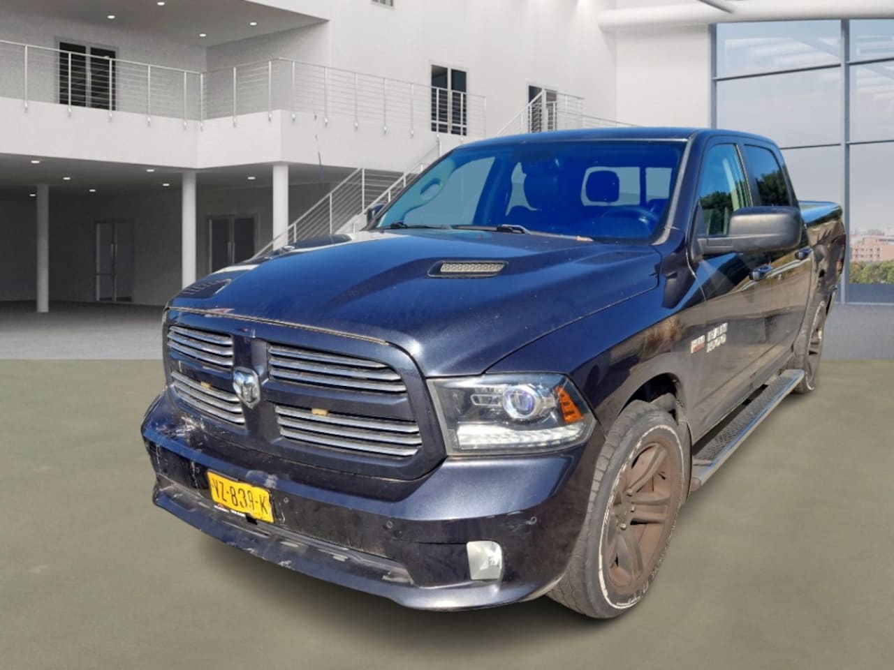Dodge Ram 1500 - 5.7 V8 4x4 Crew Cab Sport 5.7 V8 4x4 Crew Cab Sport - AutoWereld.nl