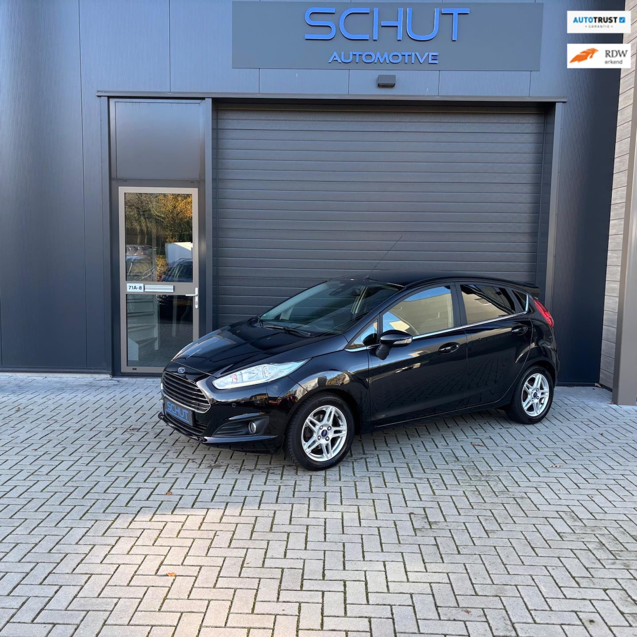 Ford Fiesta - 100pk Titanium CLIMA |NAVI | STOELVERWARMING | PDC | BLUETOOTH - AutoWereld.nl
