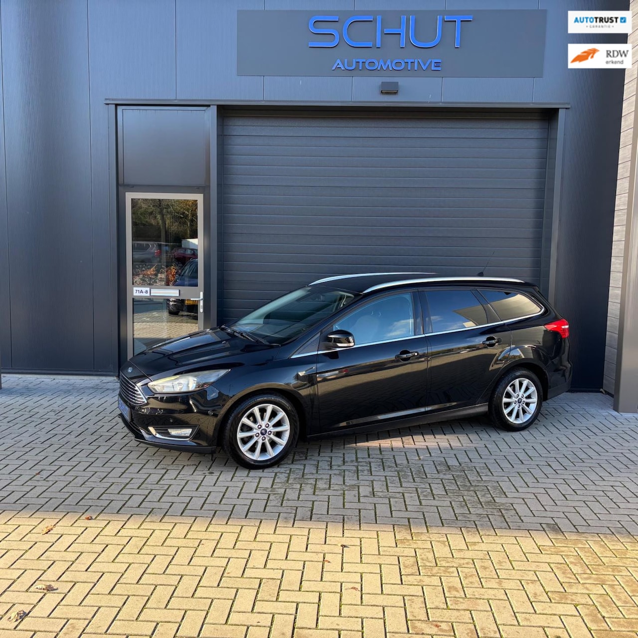 Ford Focus Wagon - 125 Titanium CLIMA | STOELVERWARMING | CRUISE CONTROL | NAVI | PDC | APP - AutoWereld.nl