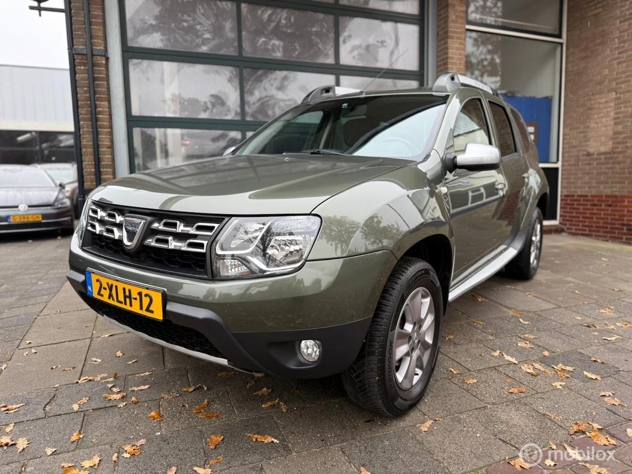 Dacia Duster - 1.2 TCe 4x2 Lauréate / Trekhaak / Leer / Bomvol! / - AutoWereld.nl
