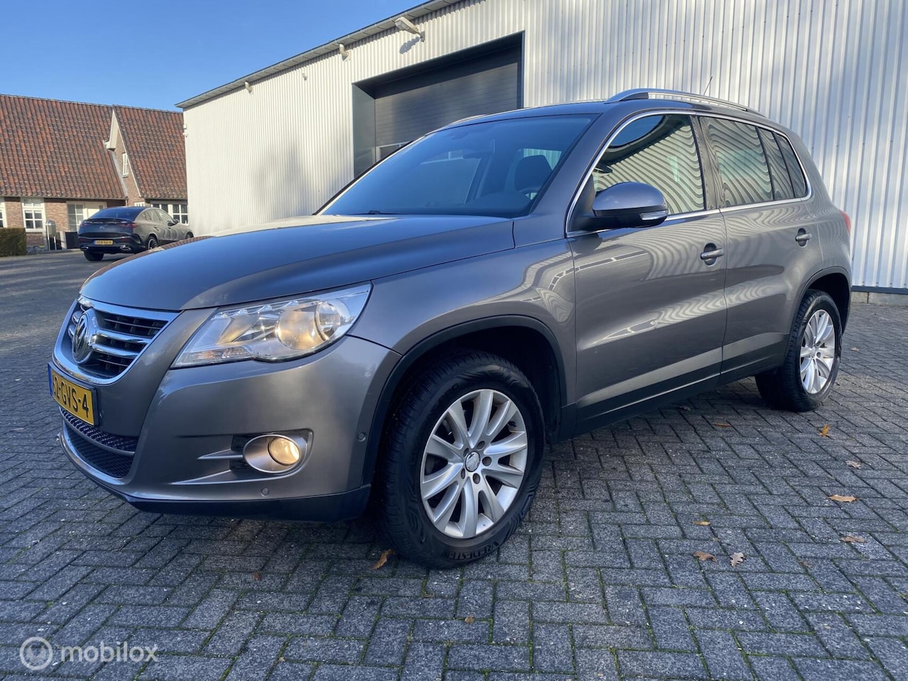 Volkswagen Tiguan - 2.0 TSI Sport&Style 4Motion - AutoWereld.nl