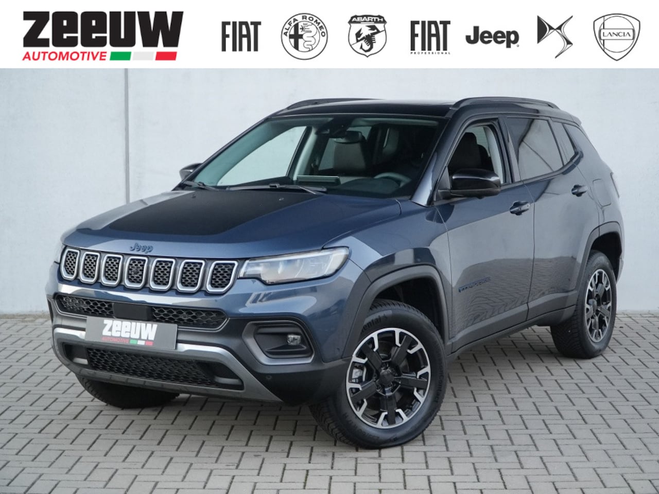 Jeep Compass - 4xe 240 PK High Upland | Navi | Pano | 360cam | Winter | ACC - AutoWereld.nl