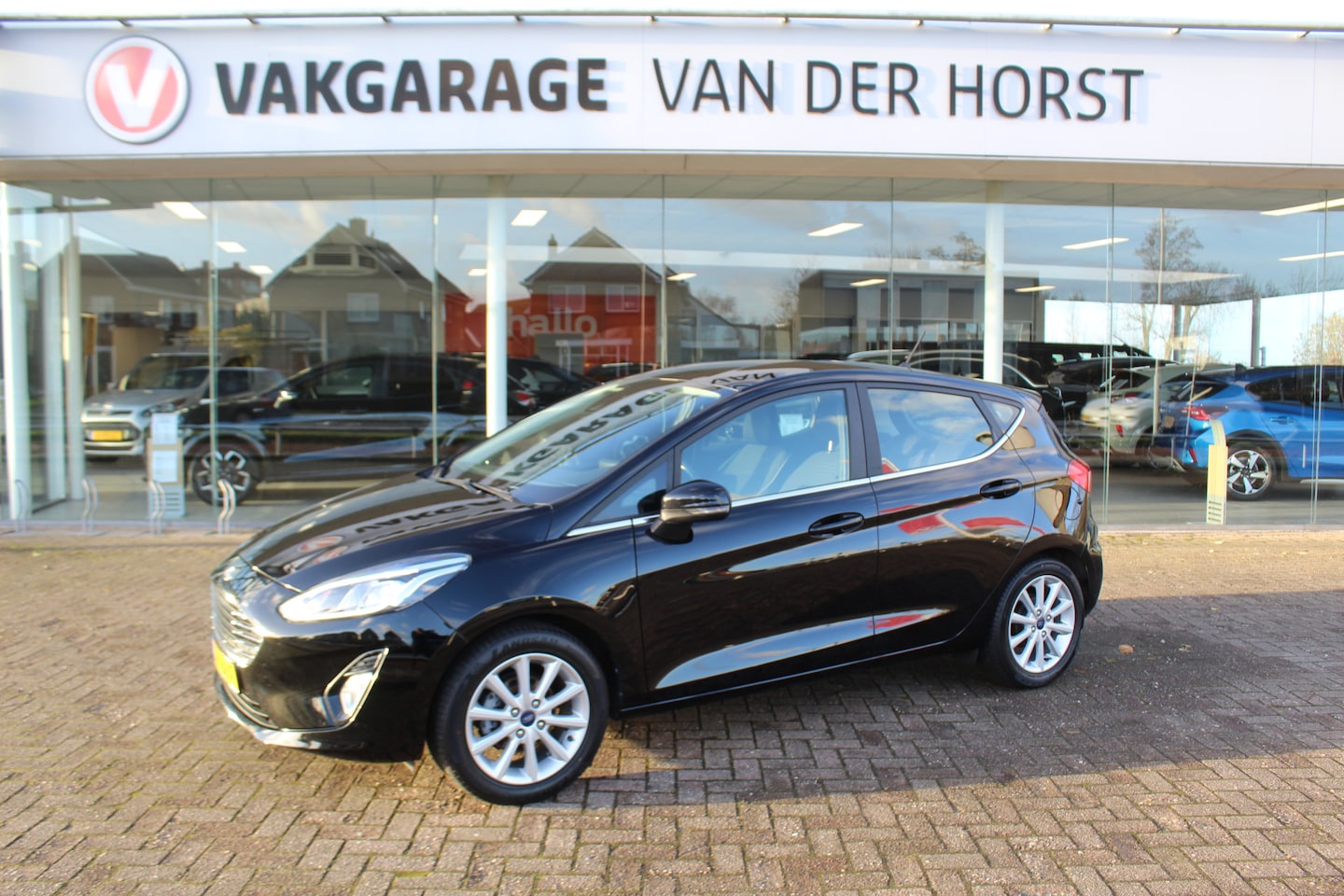 Ford Fiesta - 1.0-100pk EcoBoost Titanium 5deurs Mooie en zuinige Ford Fiesta in de luxe Titanium uitvoe - AutoWereld.nl