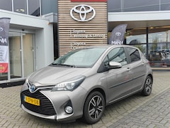 Toyota Yaris - 1.5 HYBRID LEASE 5-DEURS NAVI BLUETOOTH CAMERA CRUISE LM-VELGEN HANDSFREE