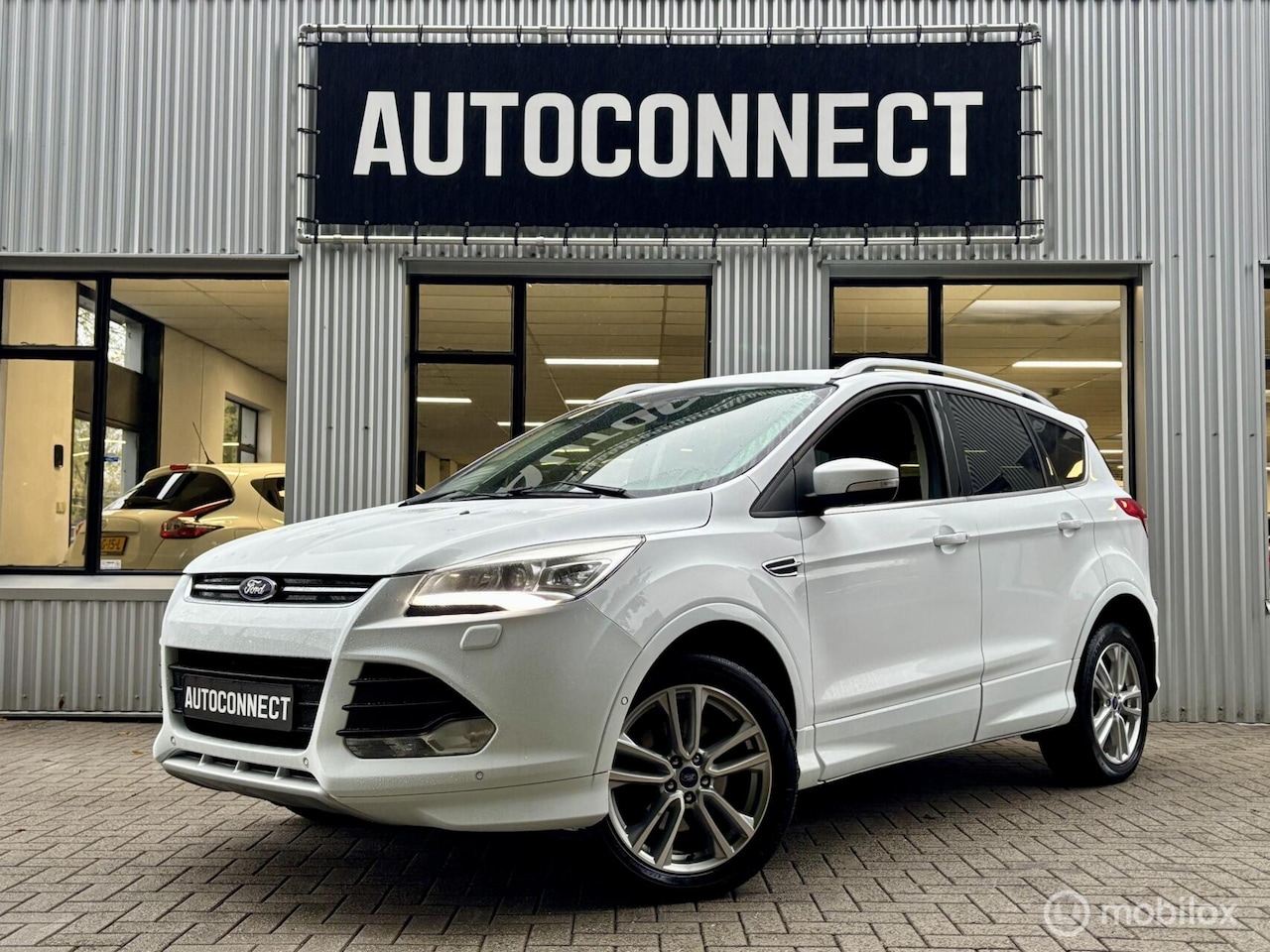 Ford Kuga - 1.6 Titanium 4WD. NAVI, CAMERA, CRUISE, STOELVERWARMING. - AutoWereld.nl