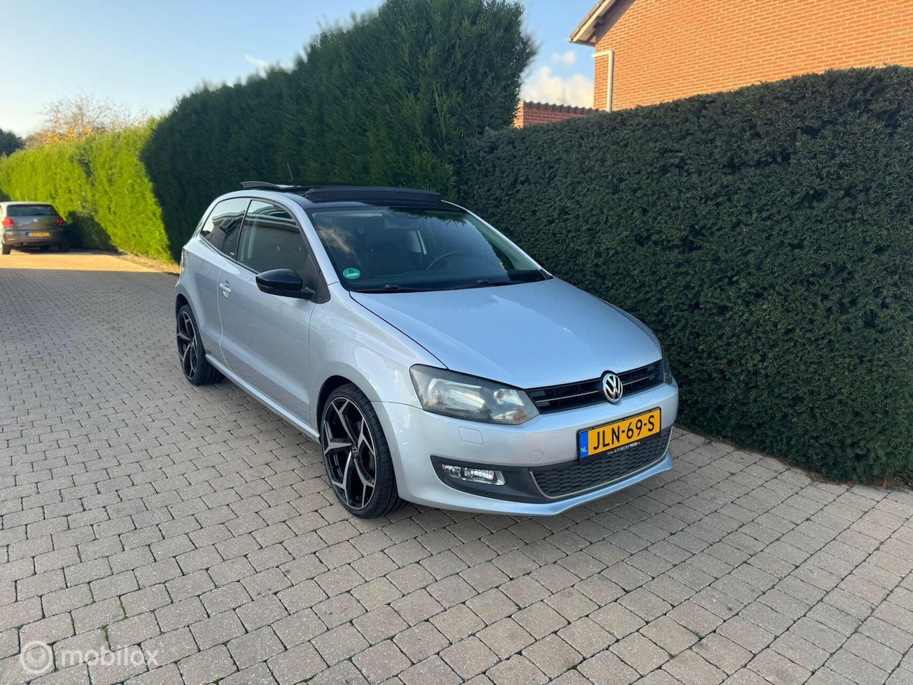 Volkswagen Polo - 1.2 TSI Highline MET PANORAMADAK - AutoWereld.nl