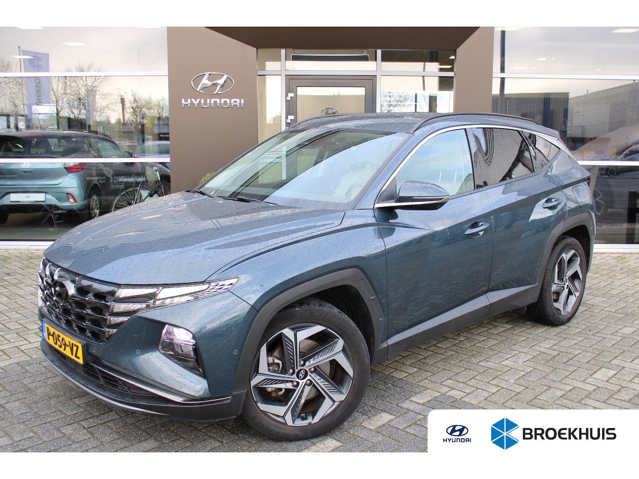 Hyundai Tucson - 1.6 T-GDI HEV Premium | Leder | Adaptive Cruise Control | Geheugenfunctie stoel | 19'' Inc - AutoWereld.nl